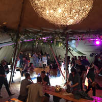 Corporate guests party in Finnebrogue Woods Tipi event venue